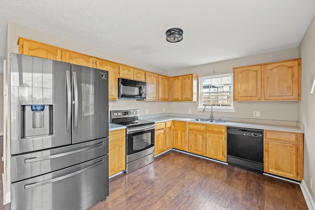 263 Hunter Ridge Dr, Lawrenceburg, KY 40342 - kitchen featuring black appliances, dark wood finished floors, light countertops, and light brown cabinetry