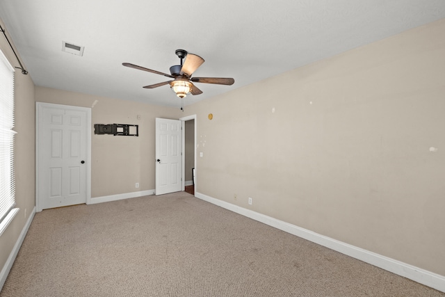 263 Hunter Ridge Dr, Lawrenceburg, KY 40342 - unfurnished bedroom featuring light carpet, ceiling fan, and multiple windows