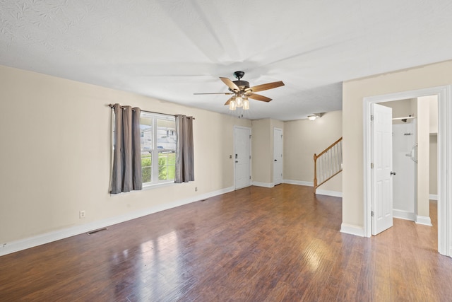 263 Hunter Ridge Dr, Lawrenceburg, KY 40342 - unfurnished living room featuring a ceiling fan, wood finished floors, and stairway