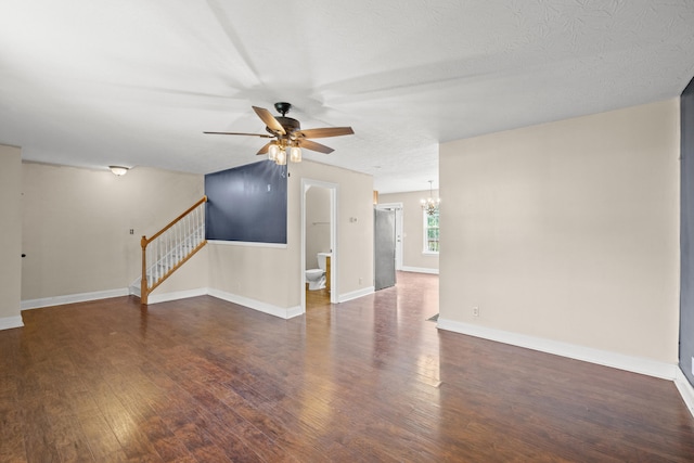 263 Hunter Ridge Dr, Lawrenceburg, KY 40342 - unfurnished living room with stairway, a ceiling fan, a chandelier, and wood finished floors