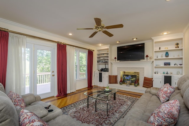 4129 Amberwood Ct, Lexington, KY 40513 - living room featuring ornamental molding, wine cooler, ceiling fan, wood finished floors, and a fireplace