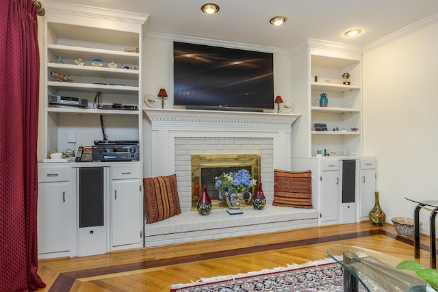 4129 Amberwood Ct, Lexington, KY 40513 - living area featuring wood finished floors, a fireplace, crown molding, and built in features