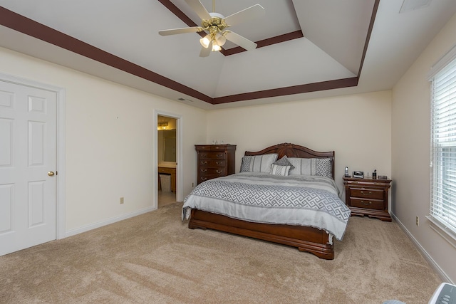 4129 Amberwood Ct, Lexington, KY 40513 - carpeted bedroom with multiple windows, a tray ceiling, ensuite bathroom, and ceiling fan