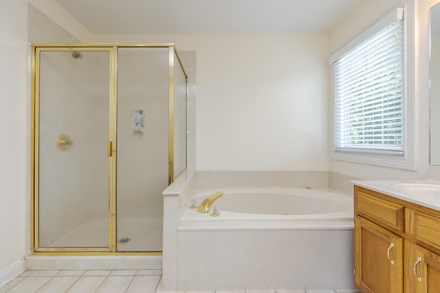 4129 Amberwood Ct, Lexington, KY 40513 - full bath featuring vanity, a shower stall, a garden tub, and tile patterned flooring