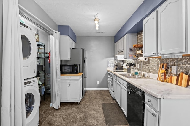 1008 Marshall Park Dr, Georgetown, KY 40324 - kitchen with black appliances, stacked washer / dryer, backsplash, light countertops, and open shelves