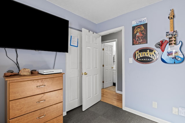 1008 Marshall Park Dr, Georgetown, KY 40324 - bedroom with baseboards and dark colored carpet