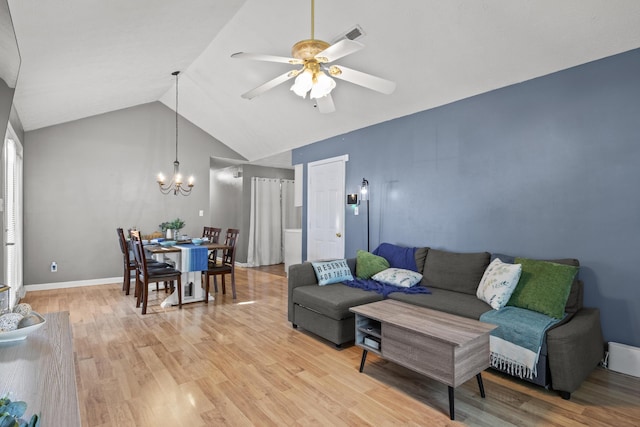 1008 Marshall Park Dr, Georgetown, KY 40324 - living room with a chandelier, a ceiling fan, vaulted ceiling, and light wood-style floors