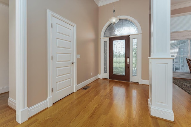 168 Master Ct, Hustonville, KY 40437 - foyer with ornamental molding, light wood-type flooring, and decorative columns
