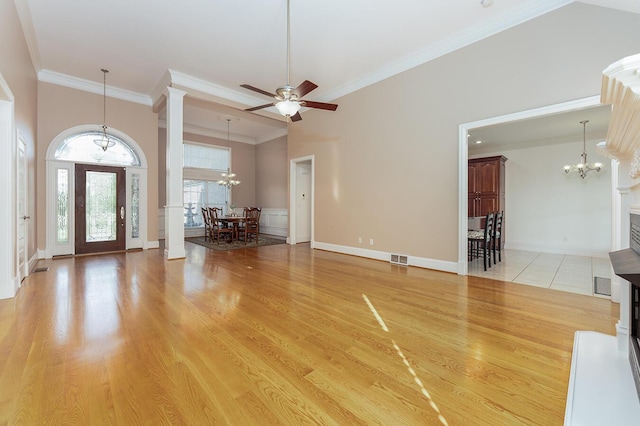 168 Master Ct, Hustonville, KY 40437 - foyer with a chandelier, crown molding, a ceiling fan, and light wood finished floors