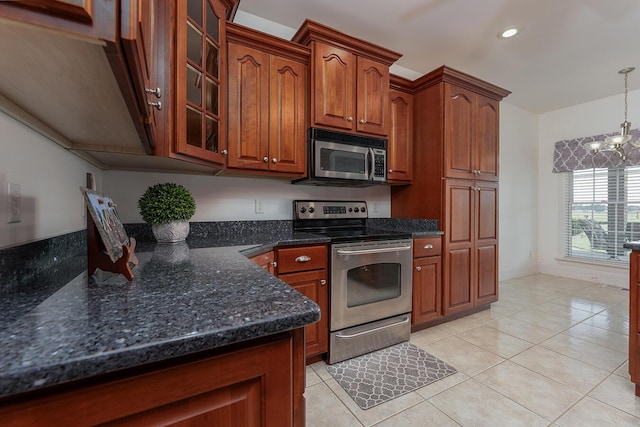 168 Master Ct, Hustonville, KY 40437 - kitchen with stainless steel appliances, light tile patterned floors, glass insert cabinets, brown cabinetry, and a chandelier