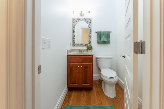 168 Master Ct, Hustonville, KY 40437 - half bathroom with wood finished floors and vanity