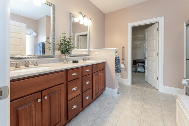 168 Master Ct, Hustonville, KY 40437 - bathroom with double vanity and tile patterned floors