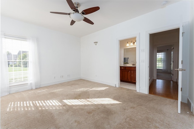 168 Master Ct, Hustonville, KY 40437 - unfurnished bedroom featuring light carpet, ensuite bathroom, and ceiling fan