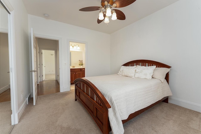 168 Master Ct, Hustonville, KY 40437 - bedroom featuring light carpet, a ceiling fan, and connected bathroom