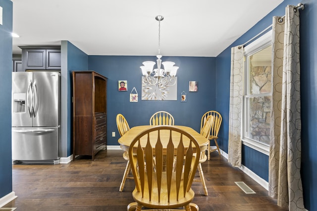 106 Louisa Ln, Georgetown, KY 40324 - dining space with a chandelier and dark wood-style flooring