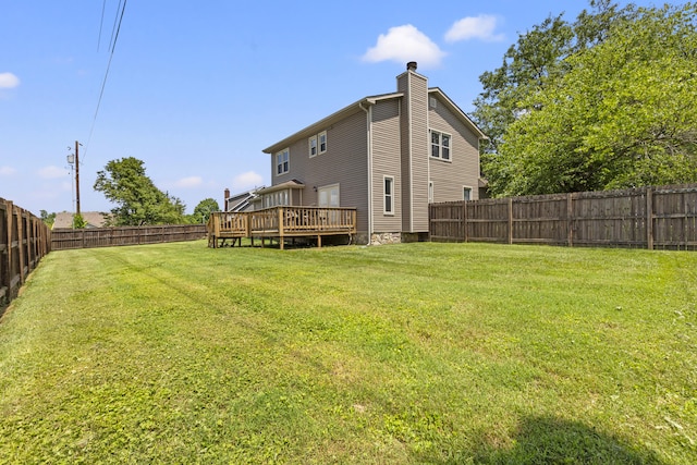 106 Louisa Ln, Georgetown, KY 40324 - back of property featuring a chimney, a fenced backyard, and a wooden deck