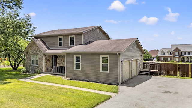 106 Louisa Ln, Georgetown, KY 40324 - view of front of house featuring asphalt driveway, a garage, and a shingled roof
