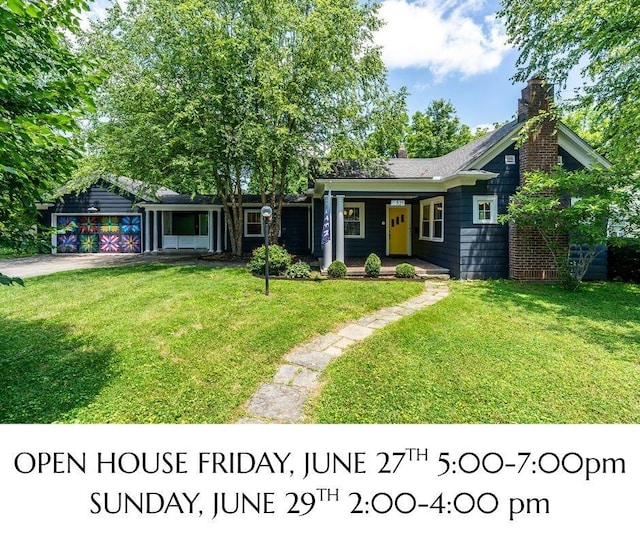 321 Center St, Berea, KY 40403 - ranch-style house with a front lawn, covered porch, a chimney, and driveway