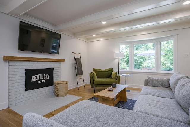 321 Center St, Berea, KY 40403 - living area featuring beam ceiling, wood finished floors, a brick fireplace, recessed lighting, and ornamental molding