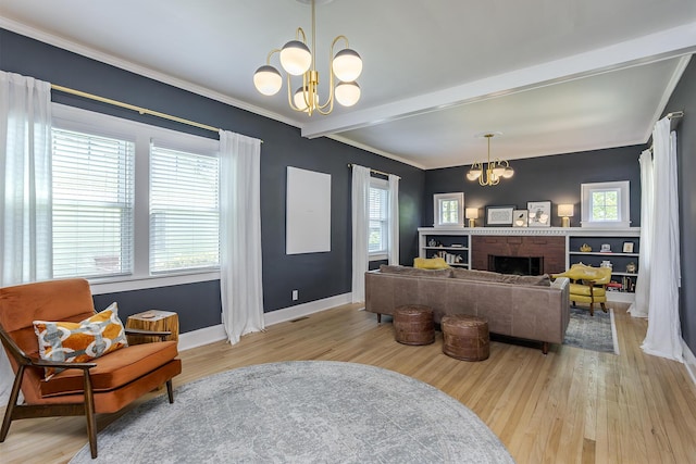 321 Center St, Berea, KY 40403 - living room with a chandelier, light wood finished floors, plenty of natural light, beamed ceiling, and ornamental molding