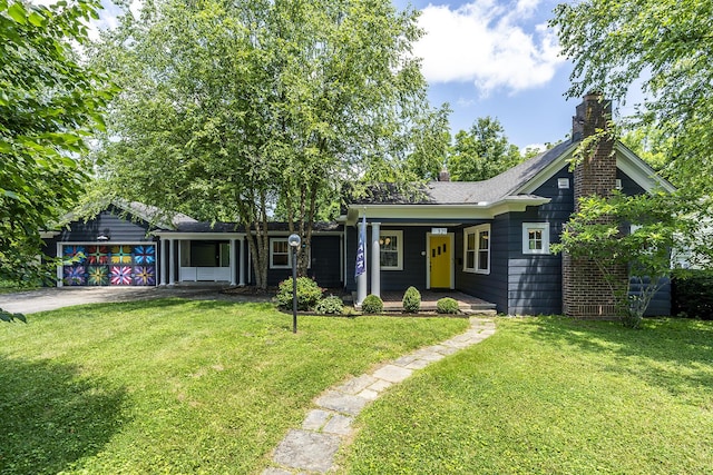 321 Center St, Berea, KY 40403 - single story home with covered porch, a front lawn, a chimney, driveway, and a shingled roof