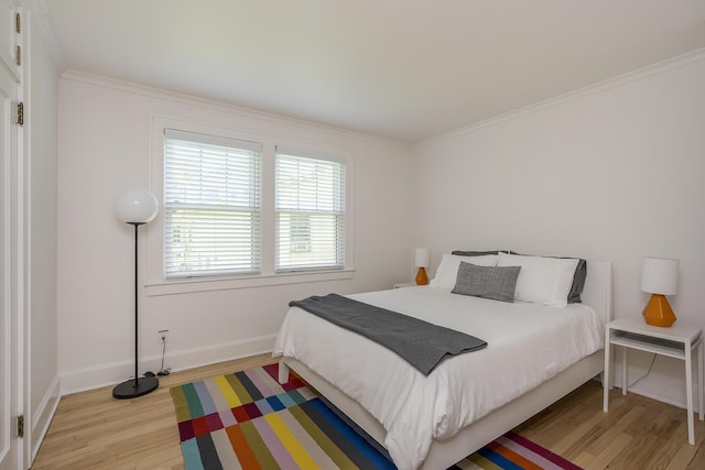 321 Center St, Berea, KY 40403 - bedroom with light wood finished floors and ornamental molding