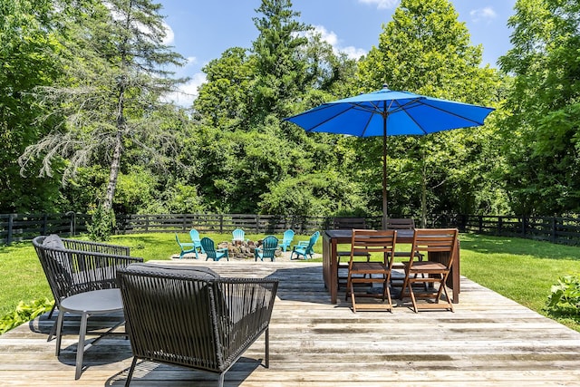 321 Center St, Berea, KY 40403 - wooden deck featuring outdoor dining area, a fenced backyard, and view of scattered trees