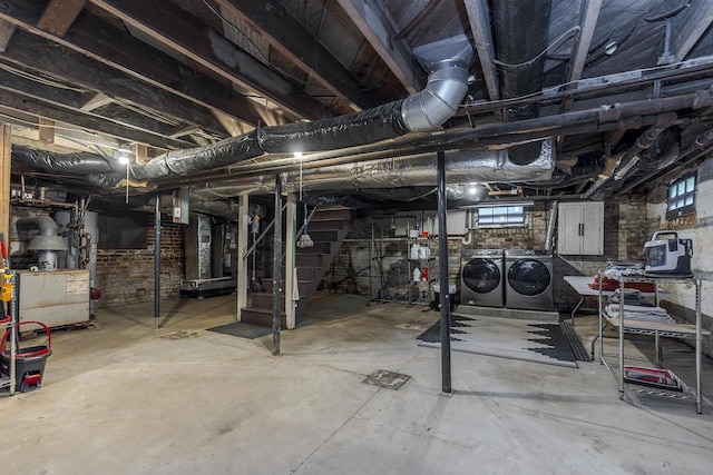 321 Center St, Berea, KY 40403 - basement with washer and clothes dryer and a heating unit