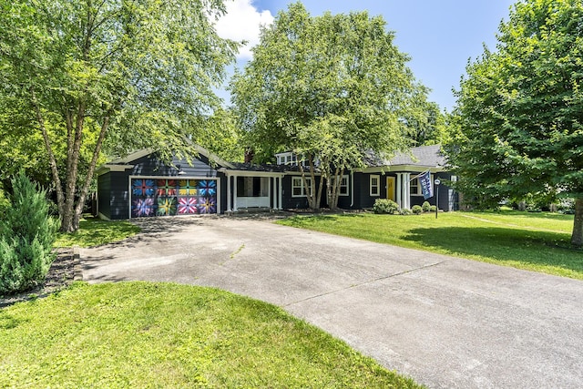 321 Center St, Berea, KY 40403 - single story home with driveway, a garage, and a front yard
