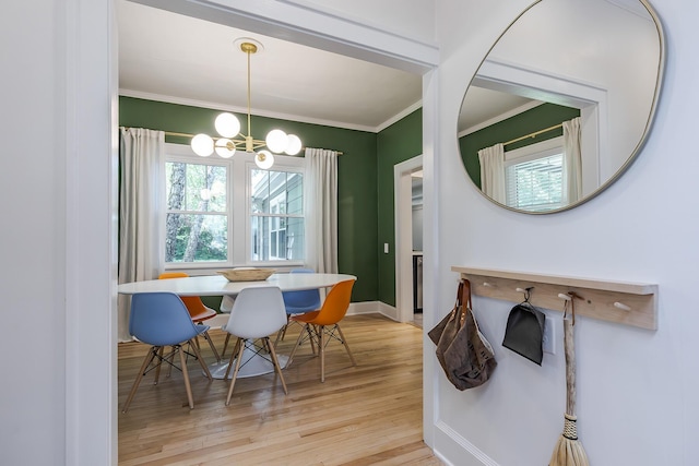 321 Center St, Berea, KY 40403 - dining space featuring ornamental molding, a chandelier, and light wood-style flooring