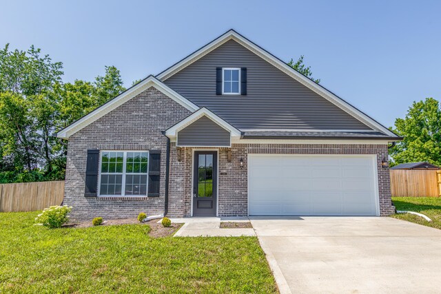 128 Bethany Trce, Lancaster, KY 40444 - traditional-style home featuring brick siding, concrete driveway, and a garage