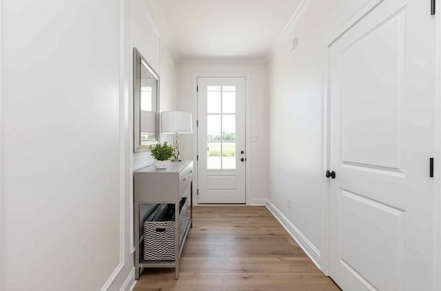 128 Bethany Trce, Lancaster, KY 40444 - doorway to outside with light wood-style flooring and ornamental molding