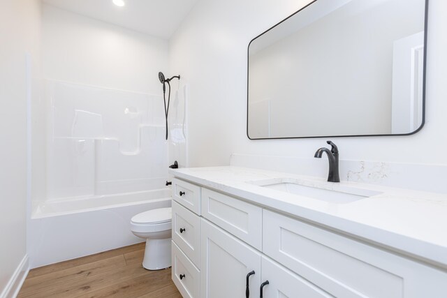 128 Bethany Trce, Lancaster, KY 40444 - bathroom with vanity, wood finished floors, shower / bath combination, and recessed lighting