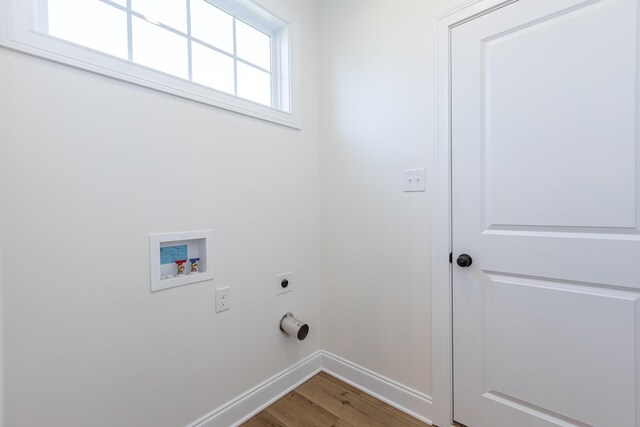 128 Bethany Trce, Lancaster, KY 40444 - washroom with electric dryer hookup, hookup for a washing machine, and light wood-style flooring