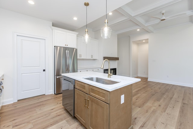 128 Bethany Trce, Lancaster, KY 40444 - kitchen with appliances with stainless steel finishes, a kitchen island with sink, recessed lighting, white cabinetry, and beamed ceiling