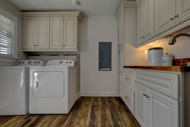 1831 Kiddville Rd, Winchester, KY 40391 - laundry area featuring independent washer and dryer, electric panel, dark wood-style flooring, and cabinet space