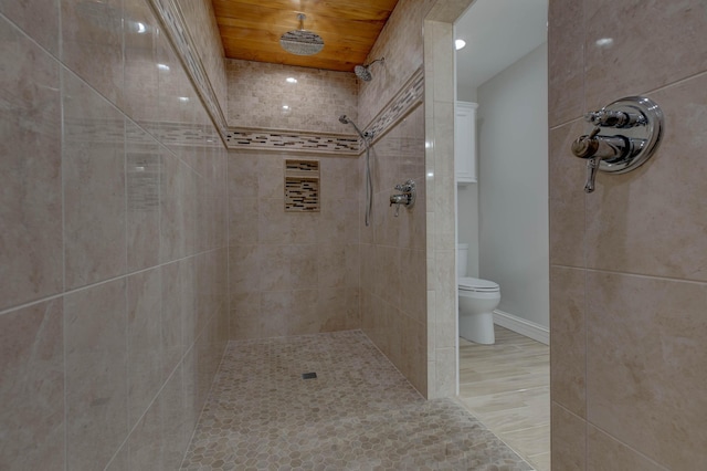 1831 Kiddville Rd, Winchester, KY 40391 - bathroom featuring a tile shower and wood finished floors