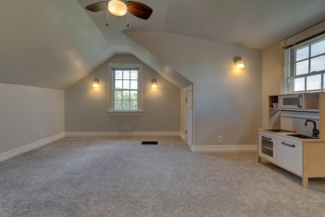 1831 Kiddville Rd, Winchester, KY 40391 - additional living space with light colored carpet, ceiling fan, and vaulted ceiling