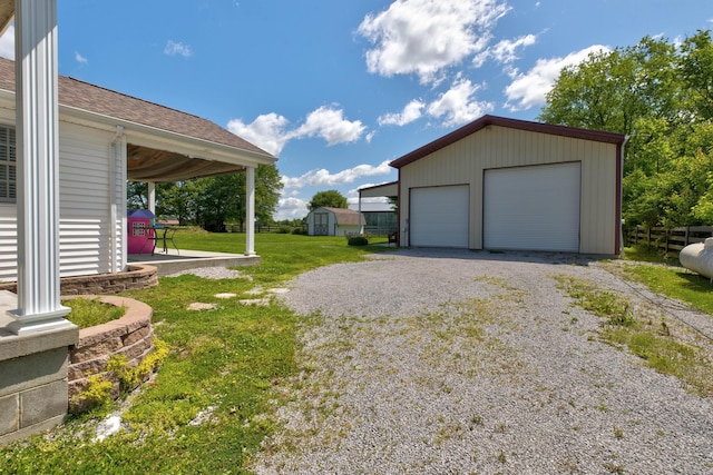 1831 Kiddville Rd, Winchester, KY 40391 - detached garage featuring a storage unit