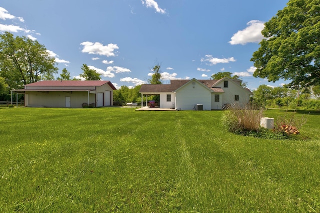 1831 Kiddville Rd, Winchester, KY 40391 - rear view of house with a yard and an outdoor structure