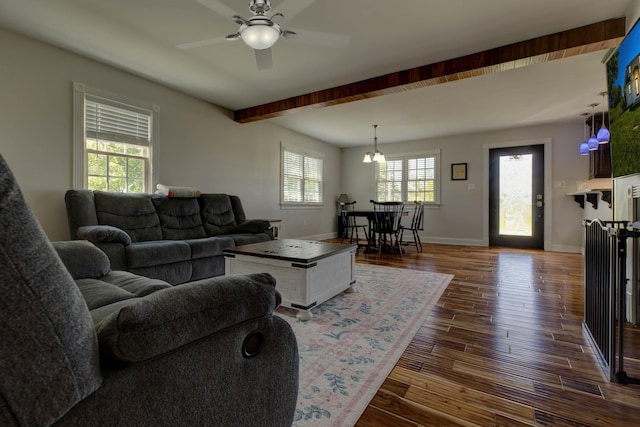 1831 Kiddville Rd, Winchester, KY 40391 - living room with dark wood finished floors, ceiling fan, beamed ceiling, and a chandelier