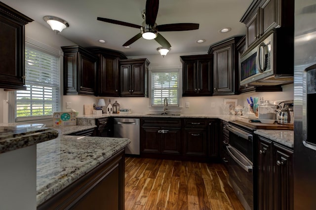 1831 Kiddville Rd, Winchester, KY 40391 - kitchen with stainless steel appliances, plenty of natural light, ceiling fan, dark wood-style flooring, and recessed lighting