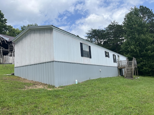 1496 Conrad Cemetary Rd, Somerset, KY 42503 - view of side of home with stairway, a lawn, and a deck