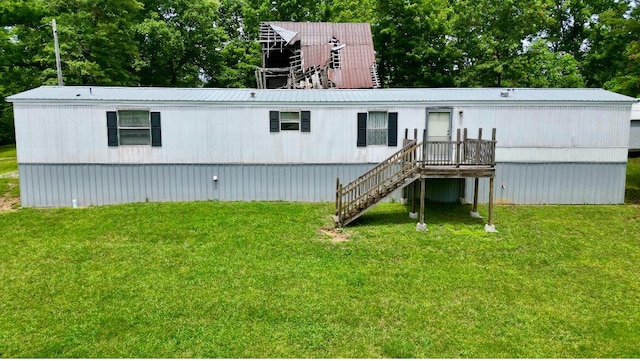 1496 Conrad Cemetary Rd, Somerset, KY 42503 - manufactured / mobile home with a front lawn, stairs, and a metal roof