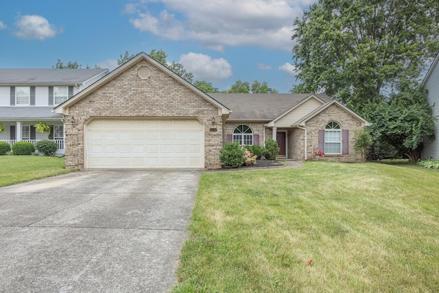 3965 Wyndham Rdg, Lexington, KY 40514 - view of front facade with driveway, a garage, brick siding, and a front lawn
