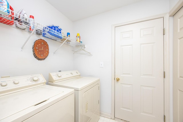 3965 Wyndham Rdg, Lexington, KY 40514 - laundry area featuring washing machine and clothes dryer and baseboards