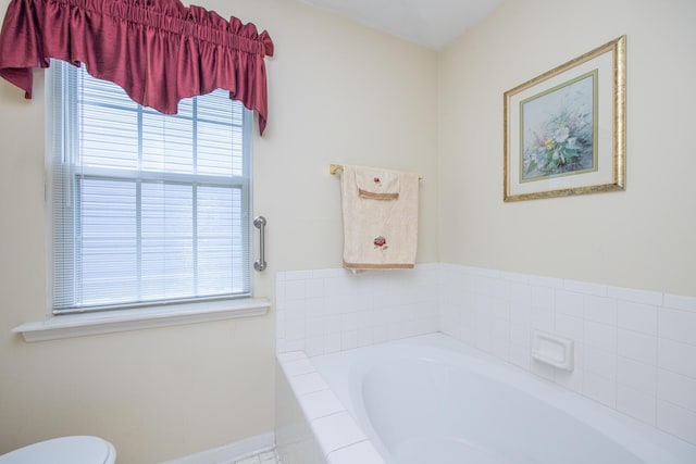 3965 Wyndham Rdg, Lexington, KY 40514 - bathroom featuring a garden tub and healthy amount of natural light