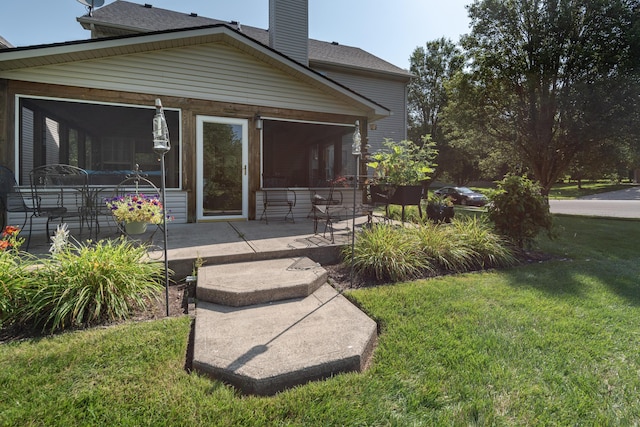 3265 Scottish Trce, Lexington, KY 40509 - rear view of property featuring a lawn, a chimney, and a patio