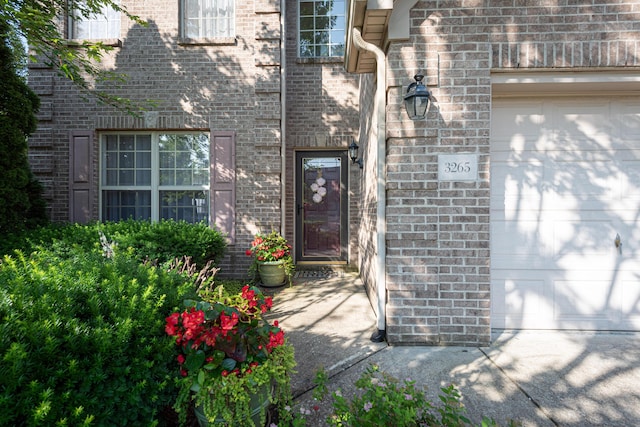 3265 Scottish Trce, Lexington, KY 40509 - view of exterior entry with brick siding and an attached garage