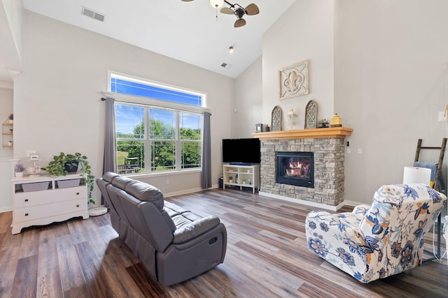 115 Westwoods Dr, Georgetown, KY 40324 - living area with high vaulted ceiling, wood finished floors, and a fireplace